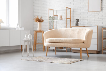 Modern interior of living room with white sofa and window
