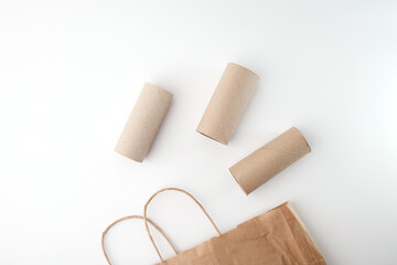 Eco cardboard rolls and paper bag for handmade decoration or craft packaging. Ideal for sustainable product design, school education, marketing or social media visuals