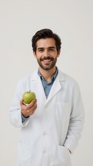 Vertical banner, wallpaper for social media of Smiling male scientist, holding a green apple, wearing a white lab coat, professional setting, front view, bright lighting, plain background