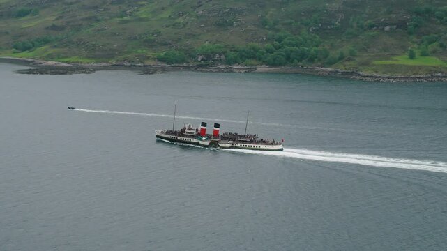 Waverley arrives in Ullapool through rainy Loch Broom showcasing historic charm and Highland scenery