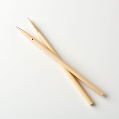 Natural Wooden Chopsticks on Clean White Surface for Culinary Use