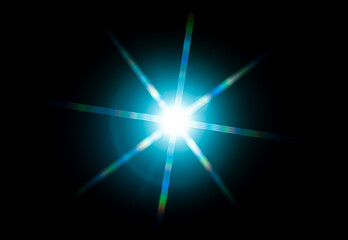 colorful flashy spotlight star made with optical star filter on camera