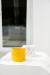 Modern Mugs on White Surface