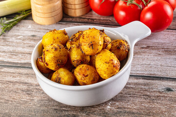 Baked small baby potato with herbs