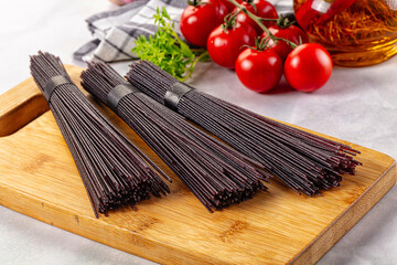 Raw black rice noodles lines