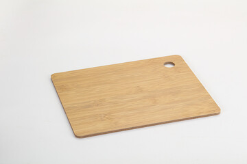 Wooden cutting board isolated on white background