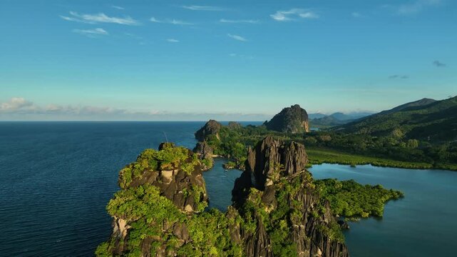 Aerial view of tropical coastline and rock formations, New Caledonia.