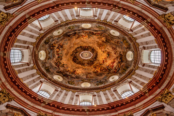 Baroque church dome with fresco and architectural details
