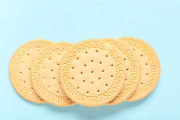 Many sweet cookies on blue background