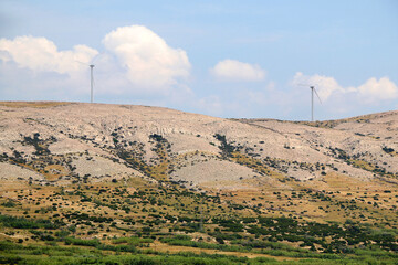 Wind turbine on the hill on island Pag, Croatia.