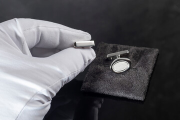Branded silver cufflinks in a box. Rare item. Stylish accessory.