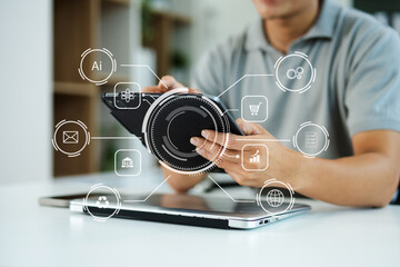 Digital marketing media in virtual screen.businesswoman hand working with mobile phone and modern...