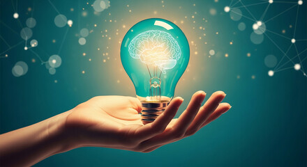 Hand holding teal lightbulb with brain inside, glowing softly against teal background, symbolizing idea, innovation, intelligence, and knowledge