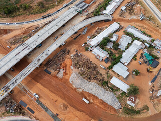 The construction site before the construction of the concrete bridge over the intersection by crane...