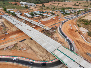 The construction site before the construction of the concrete bridge over the intersection by crane...