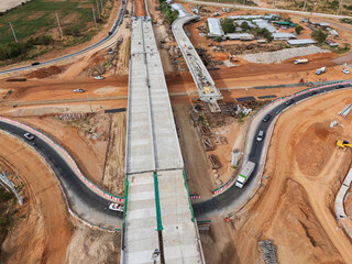 The construction site before the construction of the concrete bridge over the intersection by crane...