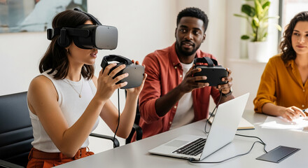 Team uses virtual reality headsets, collaborating on a project, laptop present, showcasing technology integration in modern workplace