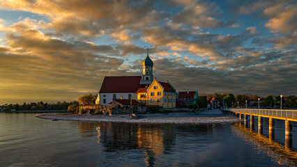 Church of St. George in Wasserburg on Lake Constance at sunset