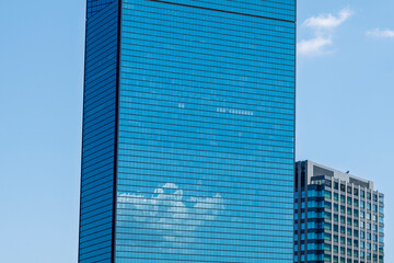 Close up glass window of Skyline and office building and downtown of Osaka cityscape, Osaka city, Japan