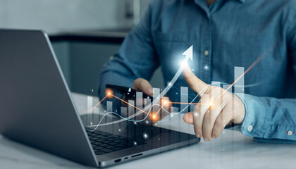 Businessman draw growth graph and progress of business data. Stock market chart, exchange financial growth diagram.Analysis finance grow graph and stock market .