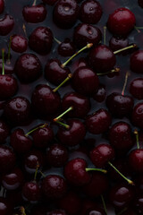 Cherries in water, with water drops