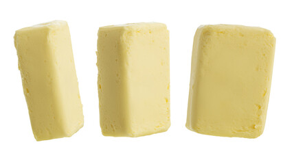 pieces of butter isolated on white background