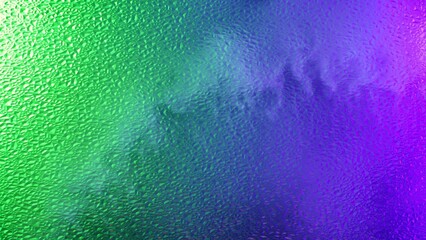 Smoke behind textured glass with green and purple lighting