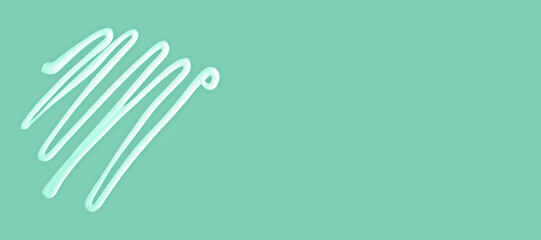 Cream lines on turquoise green background with space, cream represents freshness, skincare and cosmetic visuals. Cream concept highlights softness, cream enhances modern product and spa branding