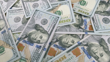 A Stack of U.S. Dollar Bills Carefully Arranged in a Neat Pile for Viewing and Handling