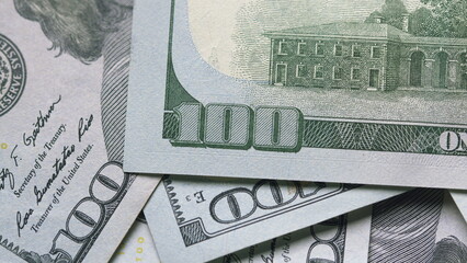 A CloseUp View of Stacked US Dollar Bills Displaying Their Intricate Details and Design