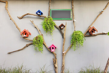 Bird House on cement background