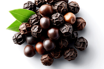 Close-up of a pile of whole black peppercorns with varying shades of brown and black, accompanied by fresh green leaves, isolated on white, natural beauty of spices in culinary use