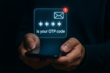Person holding a phone with an otp code notification displayed on the screen in the dark background