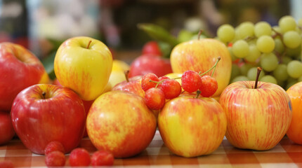 A variety of fresh fruits, including apples, grapes, and cherries.