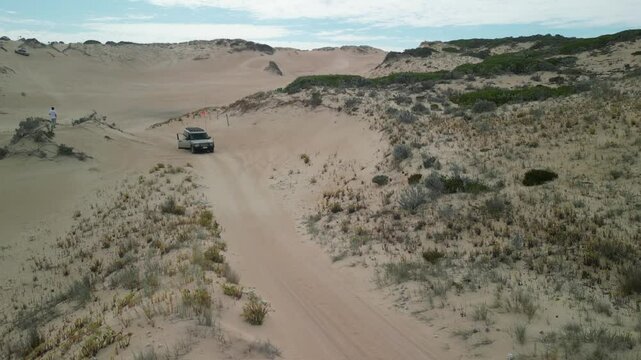 Beachport dunes in South Australia with scattered vegetation and 4WD tracks crossing the terrain