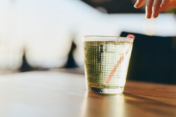 Lifestyle woman enjoying modern boho-western denim street style with film color effect, capturing relaxed mood and casual vibe in natural light setting.
