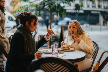Two friends seated at an outdoor cafe sharing a meal, surrounded by a lively city atmosphere. The setting conveys relaxation, friendship, and urban dining in a charming environment.