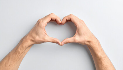 Hands Creating a Heart Shape on Grey Background