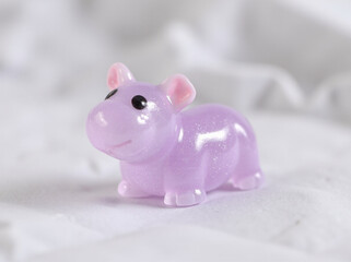A cute purple resin hippo