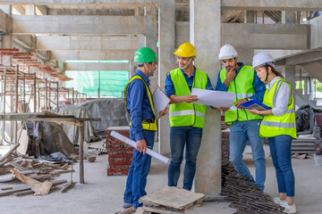 engineers team inspecting structure of a building is under new construction according to the blueprint,construction engineering,internal inspection,quality control