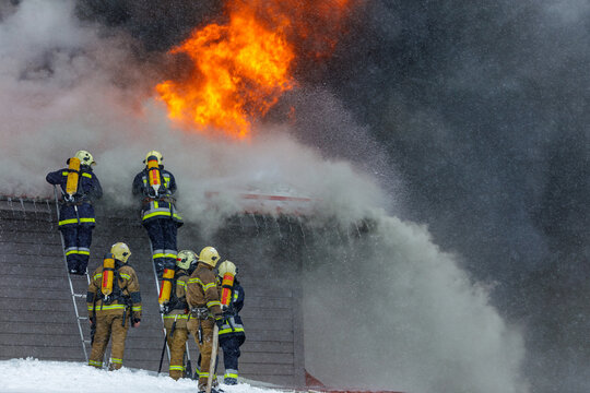 Firefighters Battle Intense Flames and Heavy Smoke During Emergency Rescue Mission