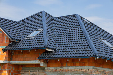 A recently completed metal roofing project highlights the durable tile design, enhancing the...