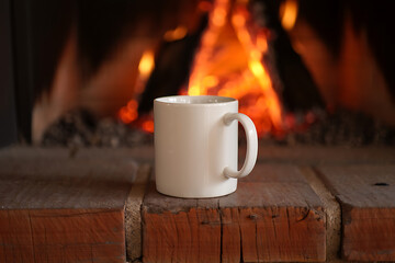 Cozy Fireplace Scene with White Mug Winter Relaxation Comfort
