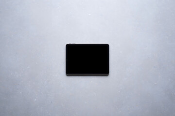 Tablet with Blank Screen Flat Lay on Grey Background Stock Photo
