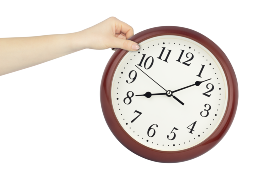 round wall clock in hand, outstretched hand with round wall clock isolated from background, time concept