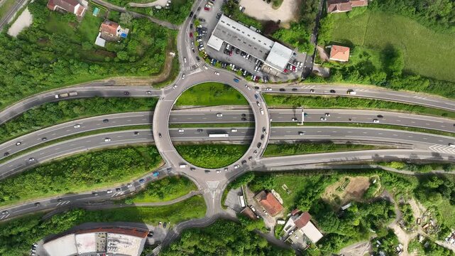 Centralized Roundabout Flyover Cutting Across Urban Freeway