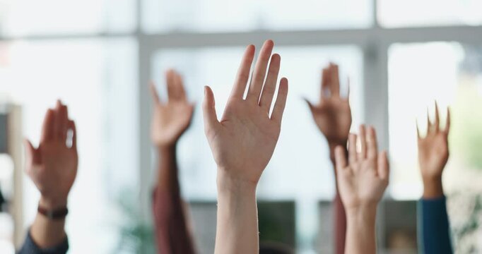 Business people, hands raised and meeting with question for engagement or interaction in office. Group, employees or team with answer for unity, solidarity or participation together in workplace