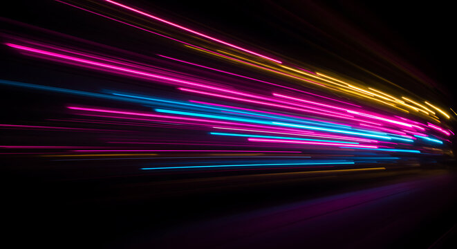 Abstract composition of colorful light trails streaking across dark background.