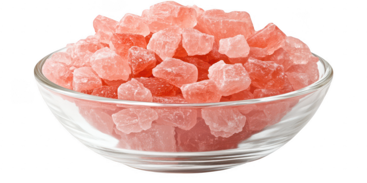 Pink salt crystals in a bowl on transparent png photo