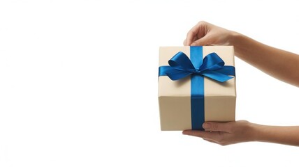 Hands holding a simple kraft paper gift box tied with a luxurious blue satin ribbon